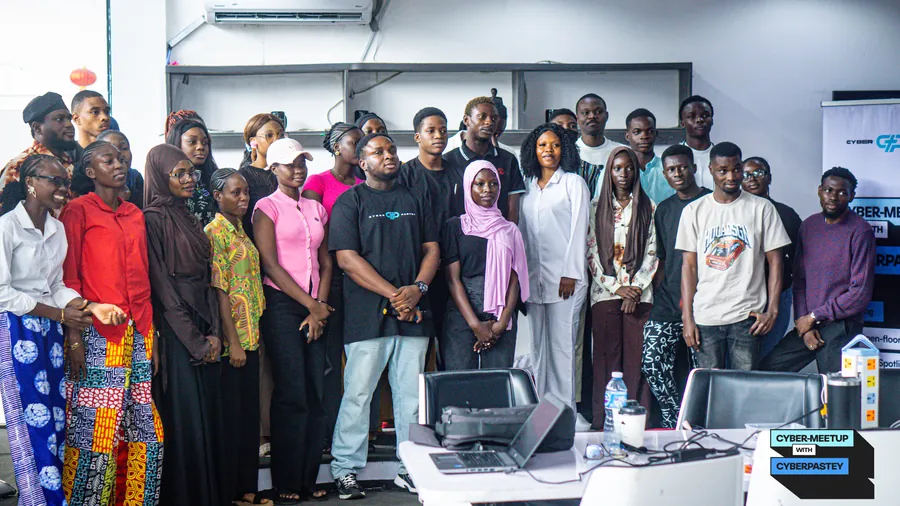 Cyber Meetup community group photograph at Café One in Ibadan